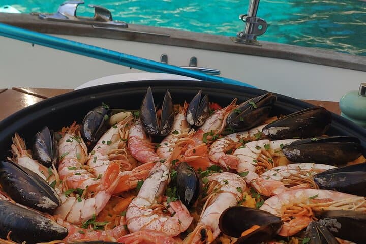 Full-Day Guided Tour by Boat with BBQ and Watertoys in Palma de Mallorca photo highlight 7